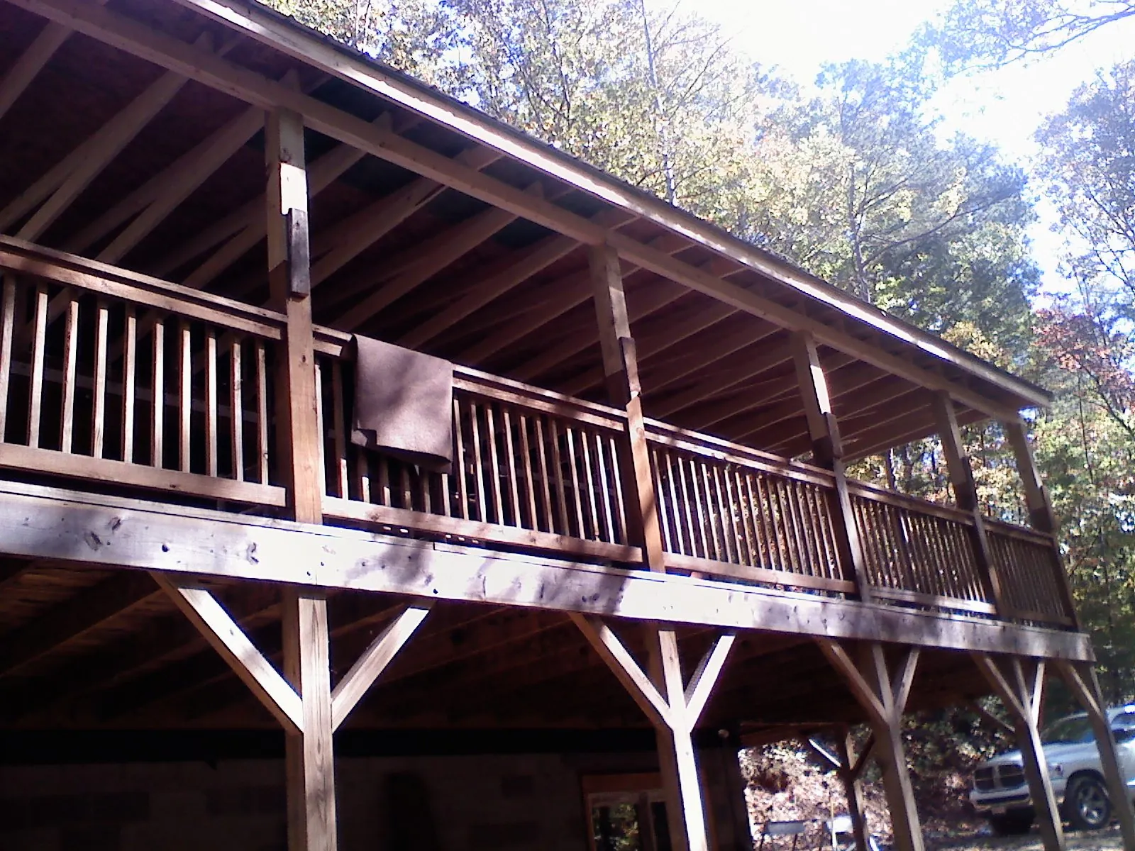 Timber framing under a new elevated porch and deck — Roof Leak Repair in Benton City by Roofing Brothers